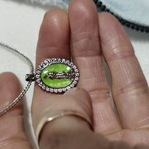 This religious necklace stainless steel  with rinestones chain is 16 inches